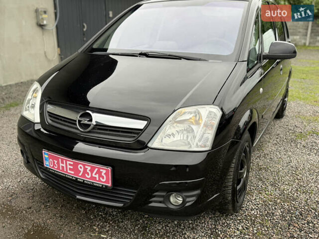 Черный Опель Мерива, объемом двигателя 1.6 л и пробегом 208 тыс. км за 4999 $, фото 22 на Automoto.ua