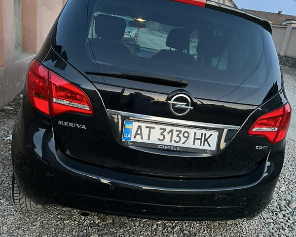 Черный Опель Мерива, объемом двигателя 1.7 л и пробегом 210 тыс. км за 7700 $, фото 6 на Automoto.ua