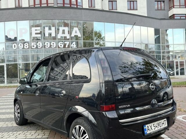 Черный Опель Мерива, объемом двигателя 1.6 л и пробегом 250 тыс. км за 4199 $, фото 8 на Automoto.ua