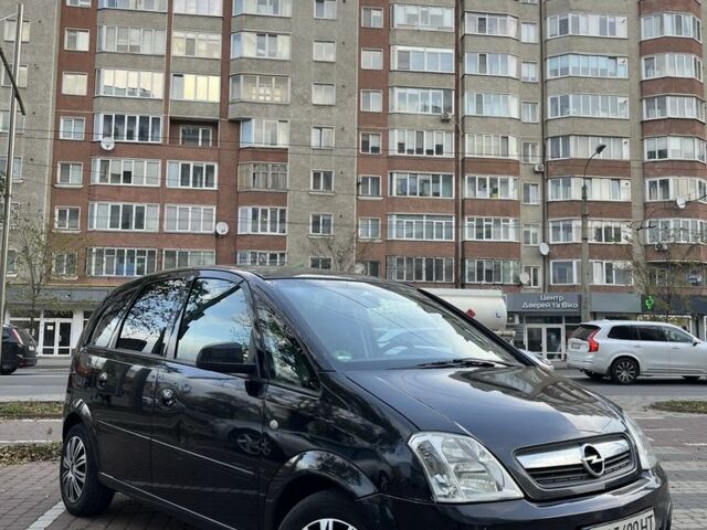 Черный Опель Мерива, объемом двигателя 1.6 л и пробегом 250 тыс. км за 4199 $, фото 3 на Automoto.ua