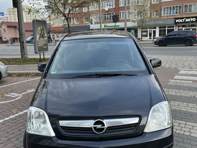 Черный Опель Мерива, объемом двигателя 1.6 л и пробегом 250 тыс. км за 4199 $, фото 1 на Automoto.ua