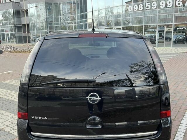 Черный Опель Мерива, объемом двигателя 1.6 л и пробегом 250 тыс. км за 4199 $, фото 7 на Automoto.ua