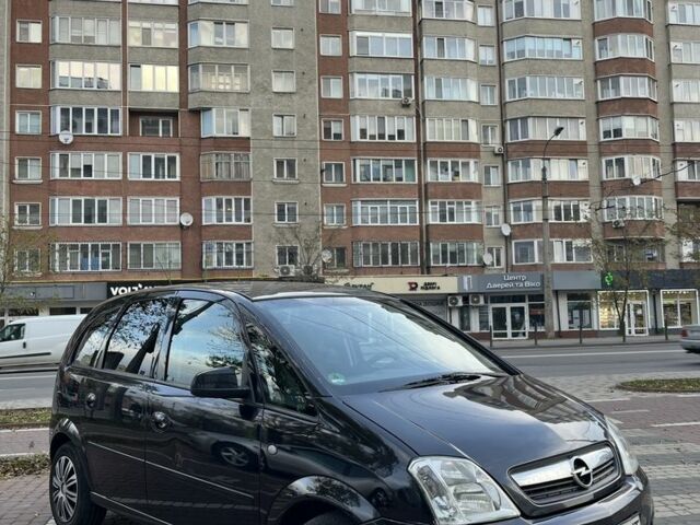 Черный Опель Мерива, объемом двигателя 1.6 л и пробегом 250 тыс. км за 4199 $, фото 2 на Automoto.ua