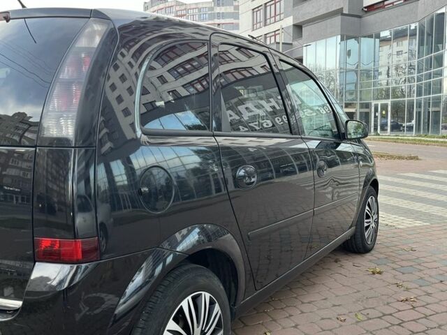 Черный Опель Мерива, объемом двигателя 1.6 л и пробегом 250 тыс. км за 4199 $, фото 5 на Automoto.ua