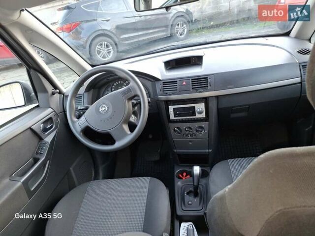 Фиолетовый Опель Мерива, объемом двигателя 1.6 л и пробегом 156 тыс. км за 5700 $, фото 8 на Automoto.ua