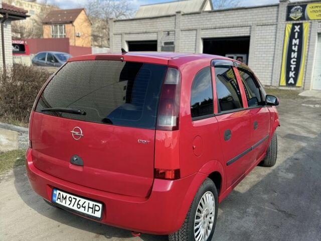 Красный Опель Мерива, объемом двигателя 1.7 л и пробегом 300 тыс. км за 2700 $, фото 3 на Automoto.ua