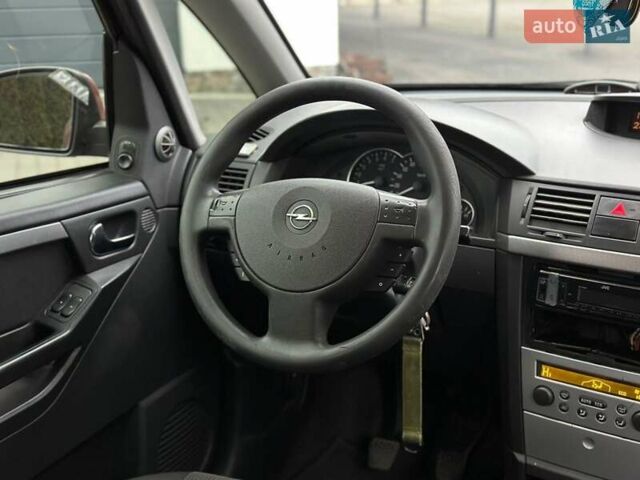 Красный Опель Мерива, объемом двигателя 1.6 л и пробегом 274 тыс. км за 2550 $, фото 12 на Automoto.ua