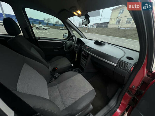 Красный Опель Мерива, объемом двигателя 1.6 л и пробегом 274 тыс. км за 3000 $, фото 30 на Automoto.ua