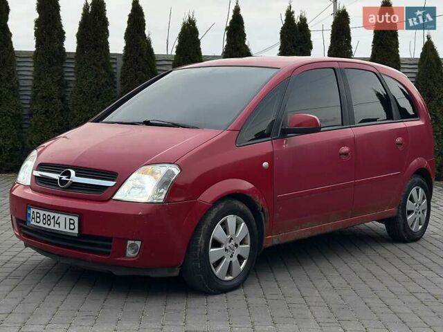 Красный Опель Мерива, объемом двигателя 1.6 л и пробегом 274 тыс. км за 2550 $, фото 1 на Automoto.ua