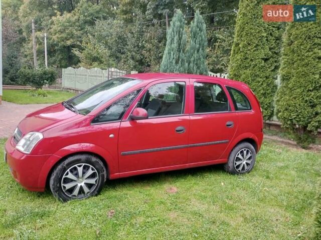 Красный Опель Мерива, объемом двигателя 1.6 л и пробегом 251 тыс. км за 3999 $, фото 9 на Automoto.ua