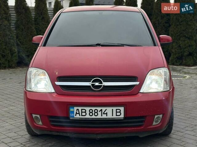 Красный Опель Мерива, объемом двигателя 1.6 л и пробегом 274 тыс. км за 2550 $, фото 6 на Automoto.ua