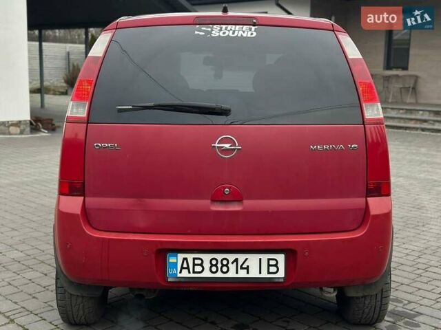 Красный Опель Мерива, объемом двигателя 1.6 л и пробегом 274 тыс. км за 2550 $, фото 4 на Automoto.ua