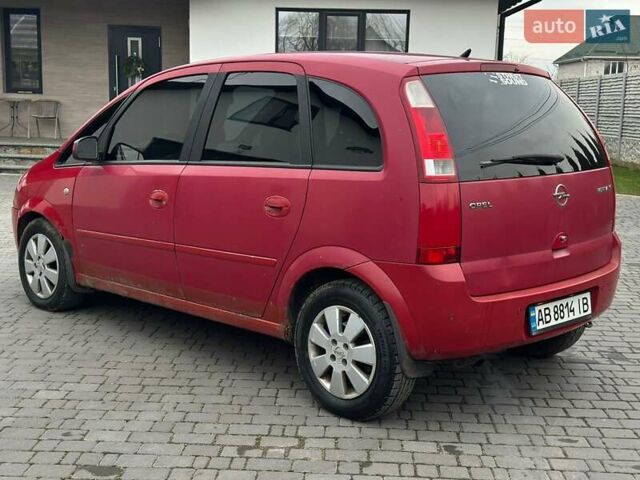 Красный Опель Мерива, объемом двигателя 1.6 л и пробегом 274 тыс. км за 2550 $, фото 3 на Automoto.ua