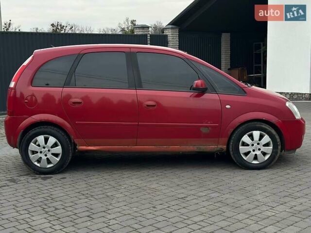 Красный Опель Мерива, объемом двигателя 1.6 л и пробегом 274 тыс. км за 2550 $, фото 5 на Automoto.ua