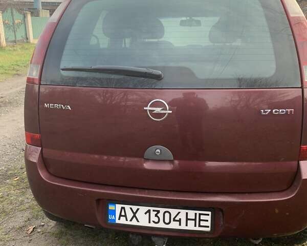 Красный Опель Мерива, объемом двигателя 1.7 л и пробегом 218 тыс. км за 3300 $, фото 3 на Automoto.ua