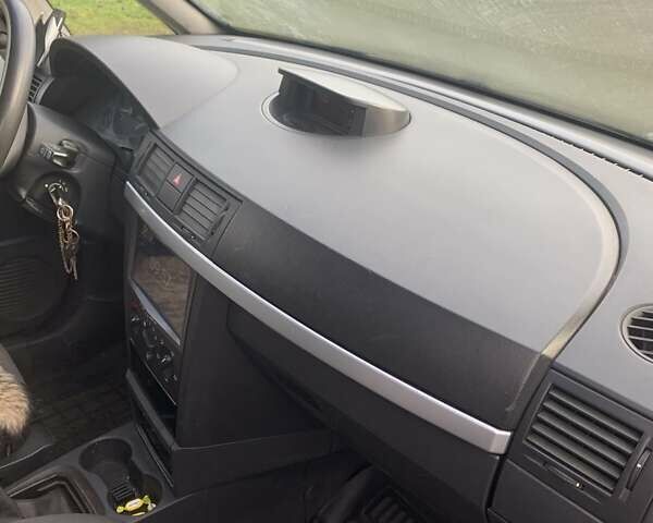 Красный Опель Мерива, объемом двигателя 1.7 л и пробегом 218 тыс. км за 3300 $, фото 8 на Automoto.ua