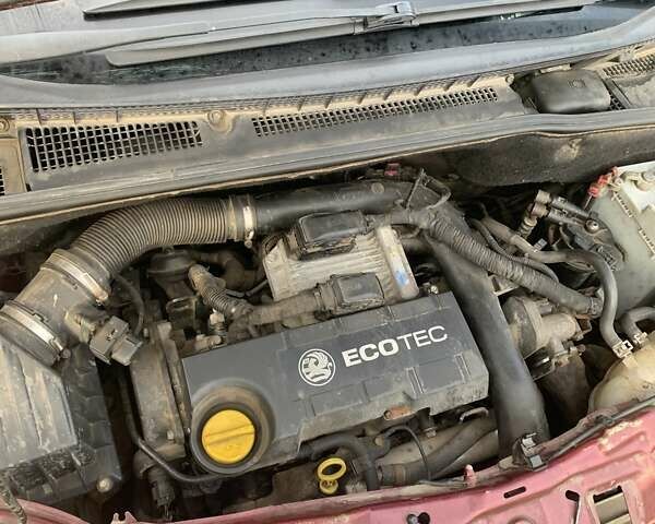 Красный Опель Мерива, объемом двигателя 1.7 л и пробегом 218 тыс. км за 3300 $, фото 7 на Automoto.ua