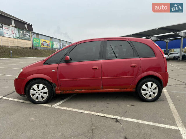 Красный Опель Мерива, объемом двигателя 1.6 л и пробегом 268 тыс. км за 2500 $, фото 3 на Automoto.ua
