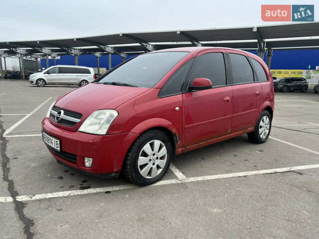 Красный Опель Мерива, объемом двигателя 1.6 л и пробегом 268 тыс. км за 2500 $, фото 1 на Automoto.ua