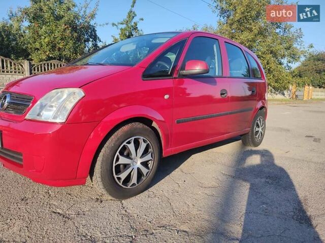 Красный Опель Мерива, объемом двигателя 1.6 л и пробегом 250 тыс. км за 4369 $, фото 11 на Automoto.ua