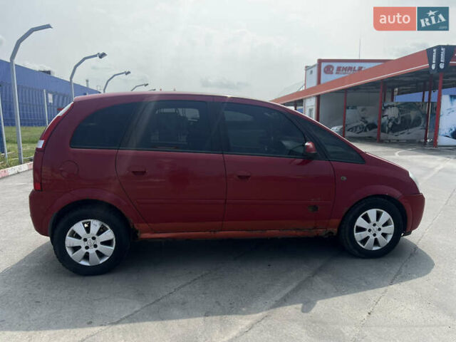 Красный Опель Мерива, объемом двигателя 1.6 л и пробегом 272 тыс. км за 2000 $, фото 6 на Automoto.ua