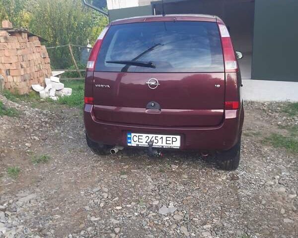 Красный Опель Мерива, объемом двигателя 1.8 л и пробегом 174 тыс. км за 4600 $, фото 19 на Automoto.ua