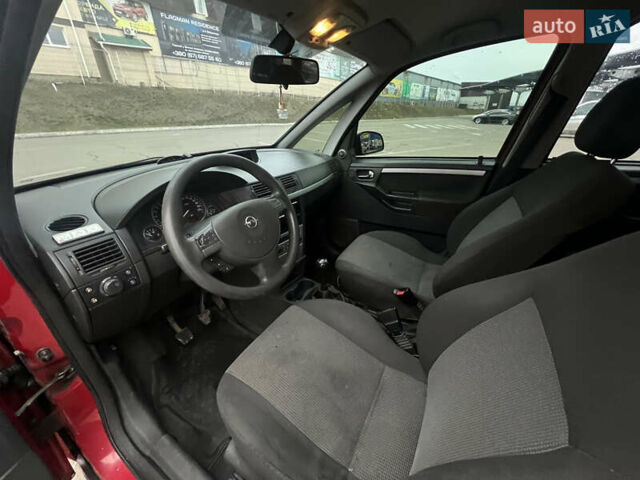Красный Опель Мерива, объемом двигателя 1.6 л и пробегом 268 тыс. км за 2500 $, фото 11 на Automoto.ua