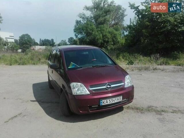 Красный Опель Мерива, объемом двигателя 1.6 л и пробегом 214 тыс. км за 4500 $, фото 1 на Automoto.ua