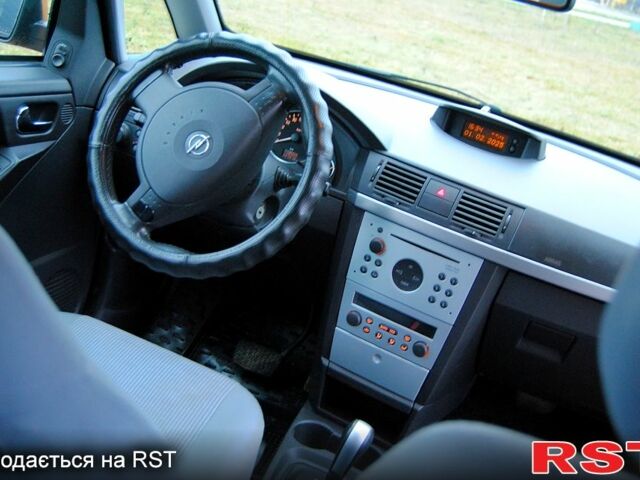Желтый Опель Мерива, объемом двигателя 1.6 л и пробегом 190 тыс. км за 4199 $, фото 3 на Automoto.ua