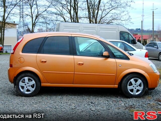 Желтый Опель Мерива, объемом двигателя 1.6 л и пробегом 190 тыс. км за 4199 $, фото 5 на Automoto.ua