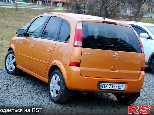 Желтый Опель Мерива, объемом двигателя 1.6 л и пробегом 190 тыс. км за 4199 $, фото 7 на Automoto.ua