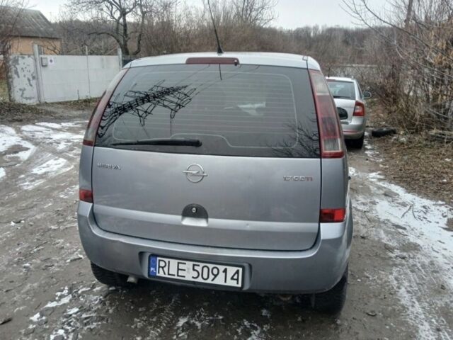 Серый Опель Мерива, объемом двигателя 1.7 л и пробегом 321 тыс. км за 1000 $, фото 9 на Automoto.ua