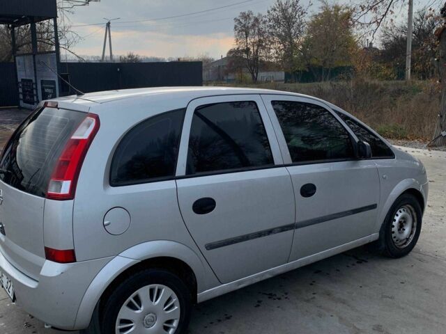 Серый Опель Мерива, объемом двигателя 1.6 л и пробегом 236 тыс. км за 2300 $, фото 2 на Automoto.ua