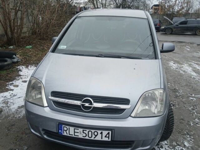 Серый Опель Мерива, объемом двигателя 1.7 л и пробегом 321 тыс. км за 1000 $, фото 7 на Automoto.ua