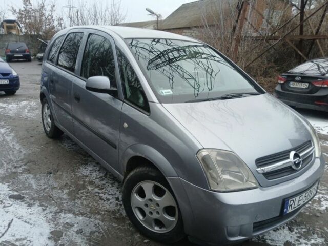 Серый Опель Мерива, объемом двигателя 1.7 л и пробегом 321 тыс. км за 1000 $, фото 3 на Automoto.ua