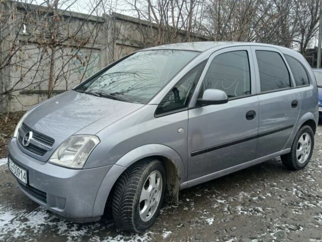 Серый Опель Мерива, объемом двигателя 1.7 л и пробегом 321 тыс. км за 1000 $, фото 12 на Automoto.ua