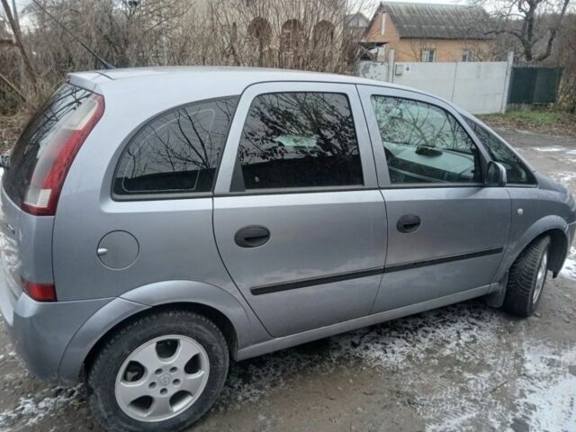 Серый Опель Мерива, объемом двигателя 1.7 л и пробегом 321 тыс. км за 1000 $, фото 17 на Automoto.ua