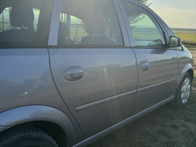 Серый Опель Мерива, объемом двигателя 1.4 л и пробегом 182 тыс. км за 3300 $, фото 6 на Automoto.ua