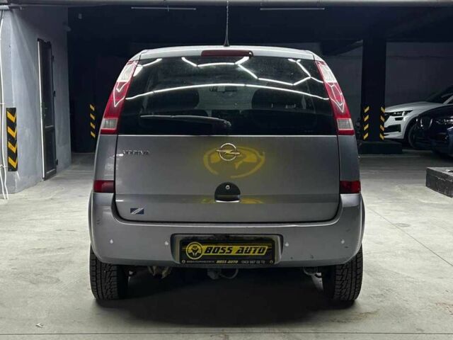 Серый Опель Мерива, объемом двигателя 1.6 л и пробегом 274 тыс. км за 4400 $, фото 4 на Automoto.ua