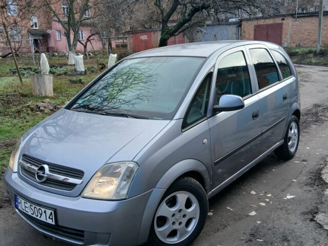 Серый Опель Мерива, объемом двигателя 1.7 л и пробегом 299 тыс. км за 1599 $, фото 1 на Automoto.ua