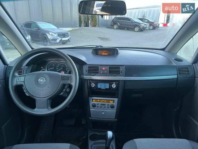 Серый Опель Мерива, объемом двигателя 1.8 л и пробегом 221 тыс. км за 5590 $, фото 35 на Automoto.ua