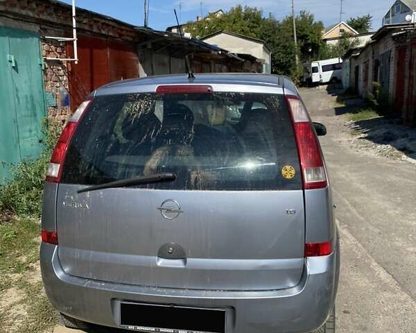 Серый Опель Мерива, объемом двигателя 1.6 л и пробегом 210 тыс. км за 4400 $, фото 3 на Automoto.ua