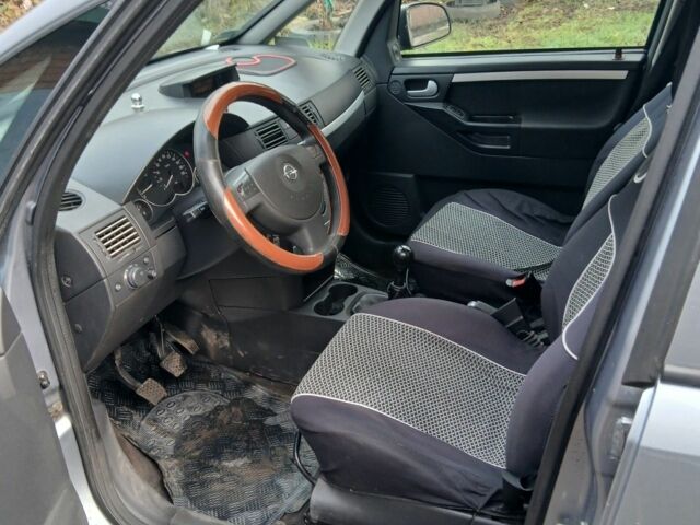 Серый Опель Мерива, объемом двигателя 1.7 л и пробегом 299 тыс. км за 1599 $, фото 7 на Automoto.ua