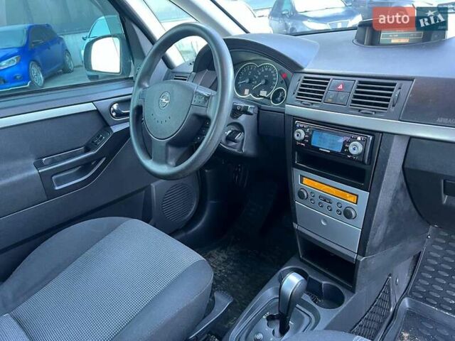 Серый Опель Мерива, объемом двигателя 1.8 л и пробегом 221 тыс. км за 5590 $, фото 39 на Automoto.ua