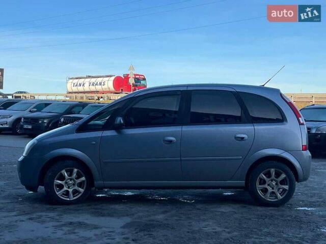 Серый Опель Мерива, объемом двигателя 1.8 л и пробегом 221 тыс. км за 5590 $, фото 4 на Automoto.ua