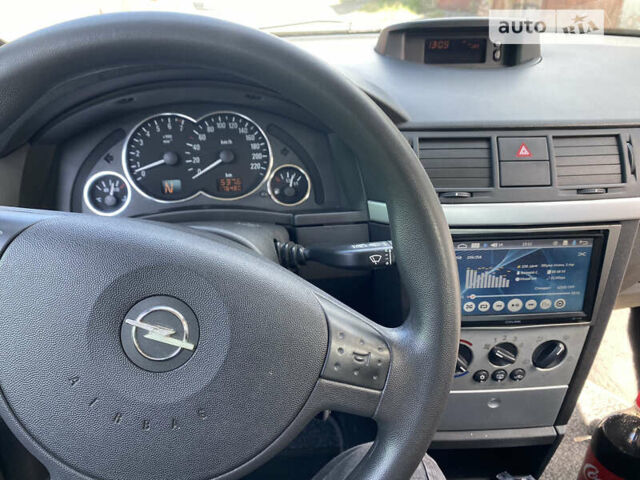 Серый Опель Мерива, объемом двигателя 1.6 л и пробегом 210 тыс. км за 4400 $, фото 6 на Automoto.ua