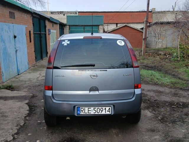 Серый Опель Мерива, объемом двигателя 1.7 л и пробегом 299 тыс. км за 1599 $, фото 4 на Automoto.ua