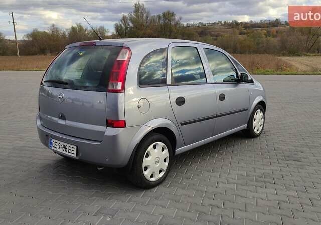 Серый Опель Мерива, объемом двигателя 1.6 л и пробегом 143 тыс. км за 4300 $, фото 6 на Automoto.ua