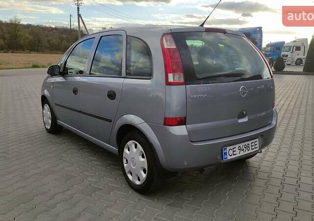 Серый Опель Мерива, объемом двигателя 1.6 л и пробегом 143 тыс. км за 4300 $, фото 4 на Automoto.ua