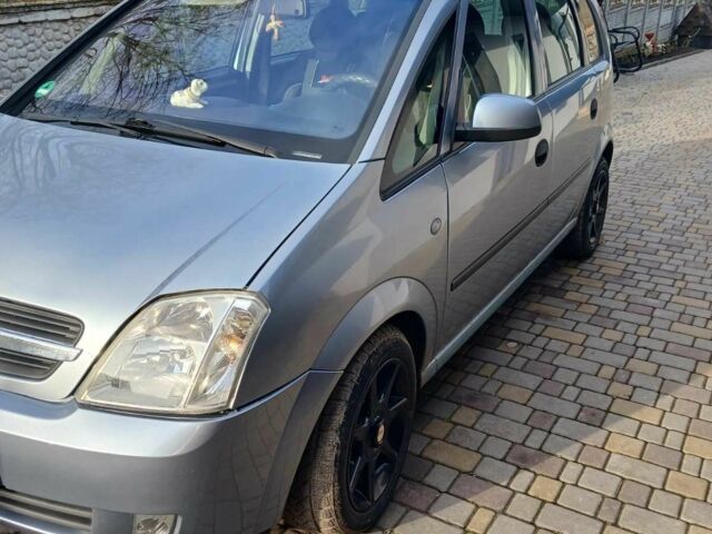 Серый Опель Мерива, объемом двигателя 1.6 л и пробегом 244 тыс. км за 4000 $, фото 1 на Automoto.ua